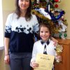 Emilia Krzemińska z klasy III b zdobyła I miejsce w Regionalnym Konkursie Kolęd i Pastorałek „Zaśpiewajmy Panu Naszemu”